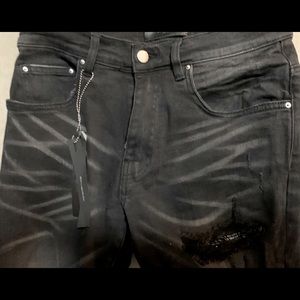 Amiri Cut Style Jeans